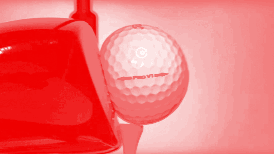 driver smashes golf ball
