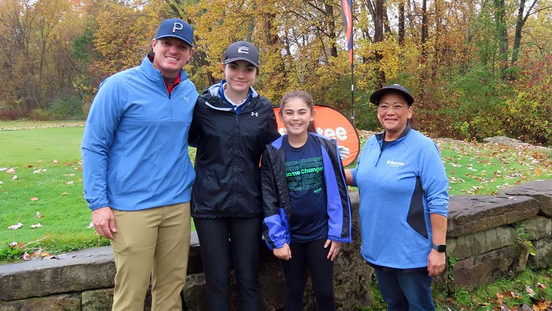 Greater Akron Board Member, Rosemary Hickin (right), played with First Tee participant Ayreana Rippey. Maddy Addessi played with her dad, Matt Addessi.