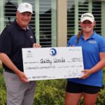 Gabby Woods is presented the 2025 Ohio Women's Open check.