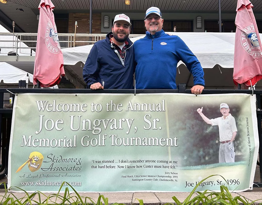 Jimmy Wild + Bobby Spino with the Ungvary Memorial banner