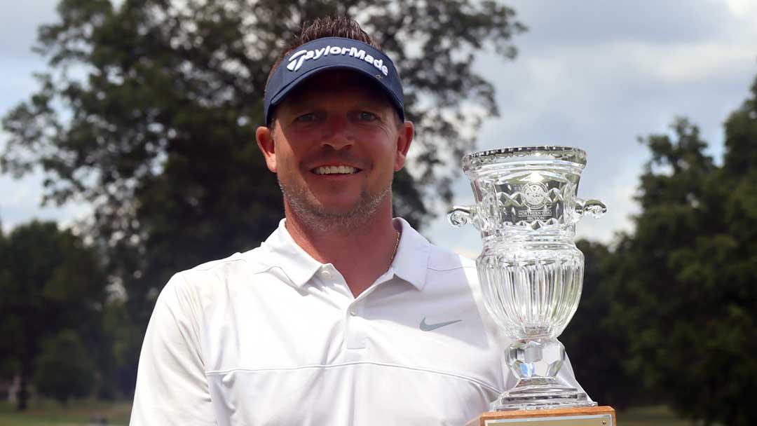 Jaysen Hansen with the 2025 NOPGA Professional Championship trophy.