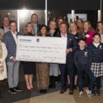 2025 Kaulig Companies Championship check presentation for charitable giving.